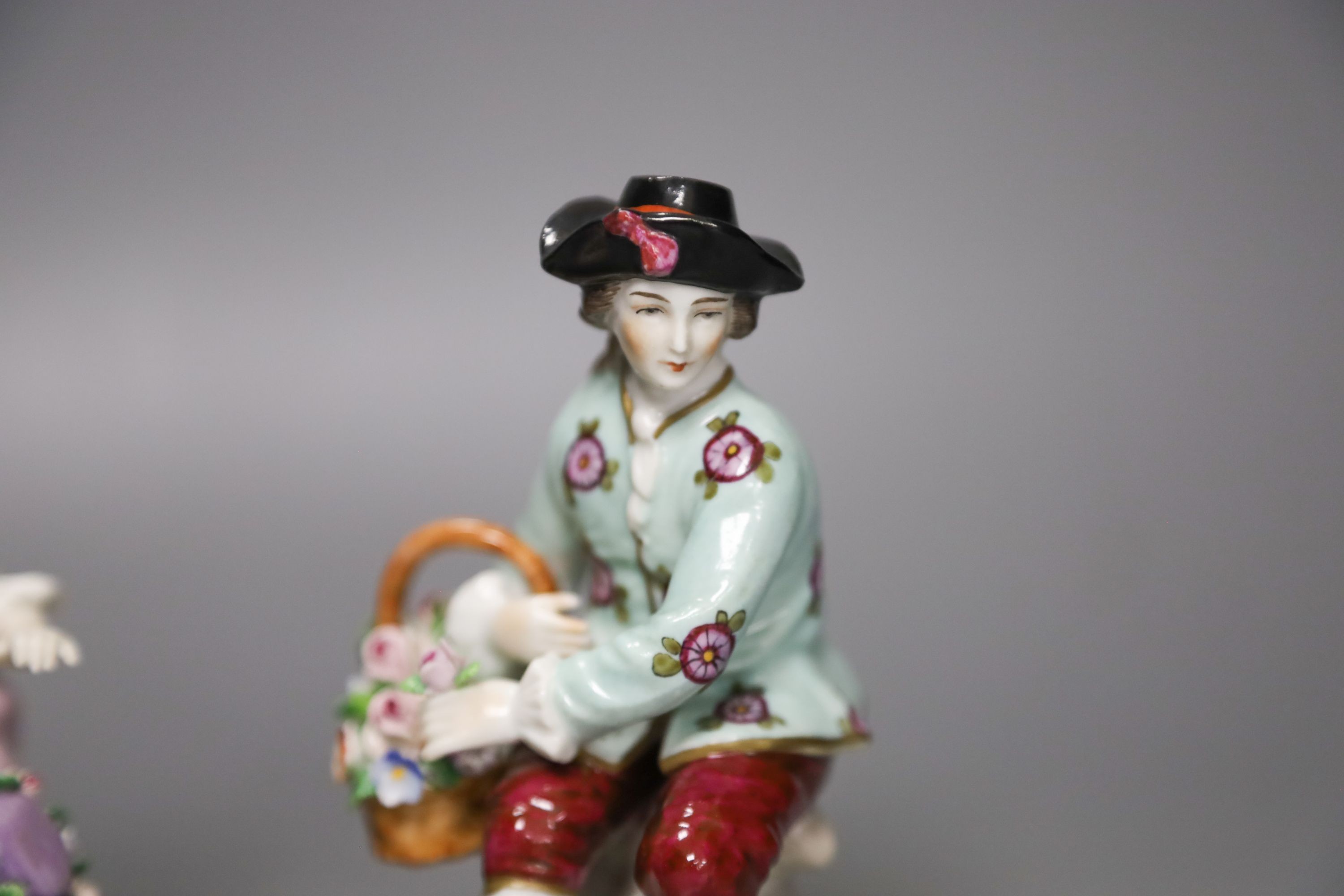 Two pairs of Continental porcelain figures, 35cm